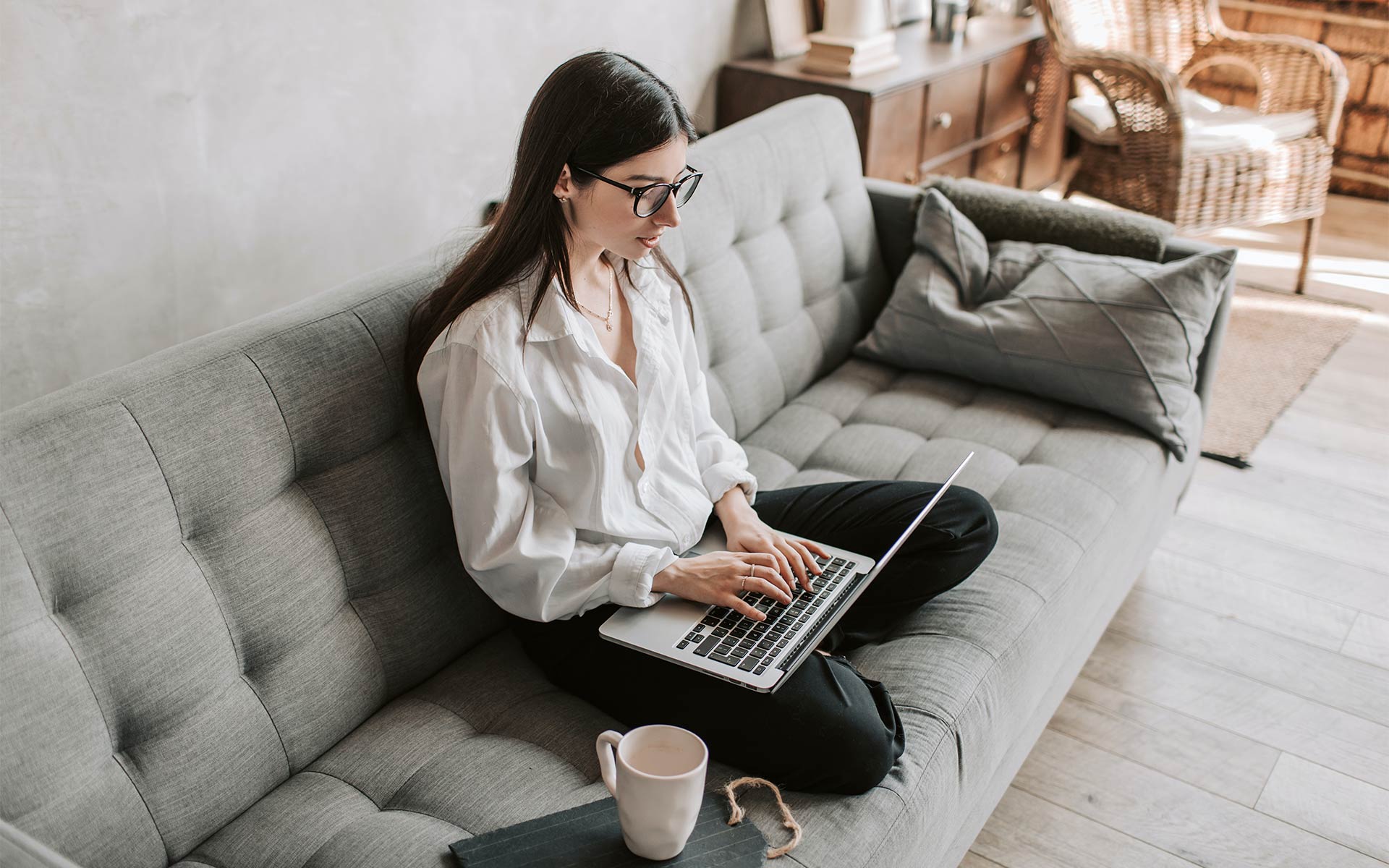 Woman Working On Couch Woman Working On Couch